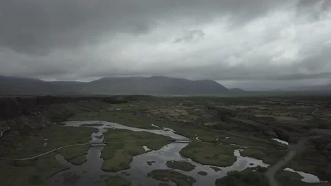 Marsh in Iceland with mountains behind Stock Footage 166872025