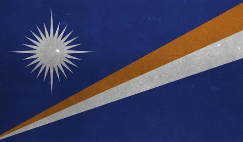 Marshall Islands flag with the effect of crumpled paper and grunge Stock Illustration