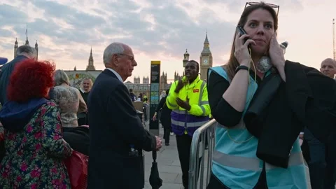 Marshals at checkpoint for Queue to see Queen lying in state Stock Footage 212989505