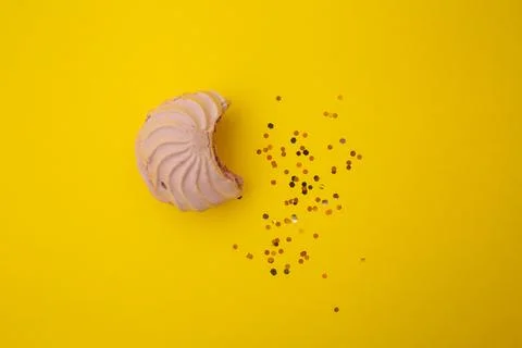 Marshmallow bites on a yellow background Stock Photos