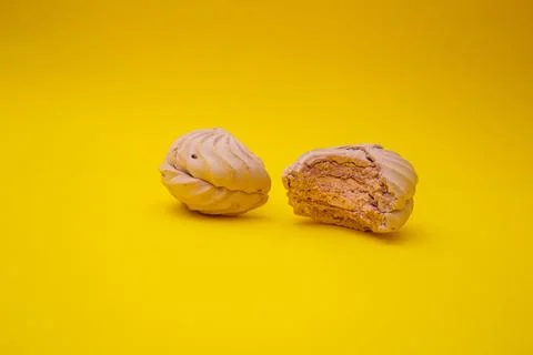 Marshmallow bites on a yellow background Stock Photos
