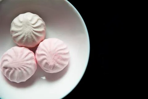 Marshmallow on black background Stock Photos