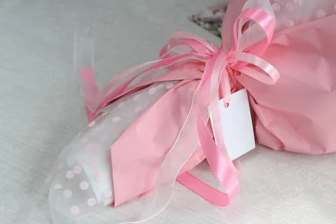 Marshmallow bouquet packaging elements. Packed in craft paper. Close-up. Stock Photos