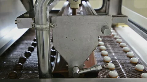 Marshmallow chocolate enrobing machine Stock Footage 46233611