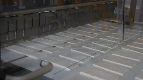 Marshmallow is cut on a conveyor line  Stock Footage 146162116