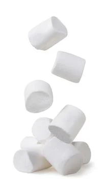 Marshmallow falls on a pile on a white background. Isolated Stock Photos