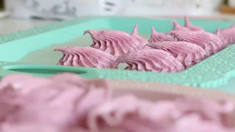 Marshmallow in the form of a rose lies on a tray. It stabilizes after formati Stock Footage 134450182
