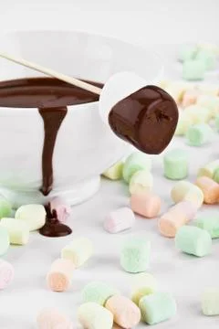 Marshmallow  with melted chocolate Stock Photos