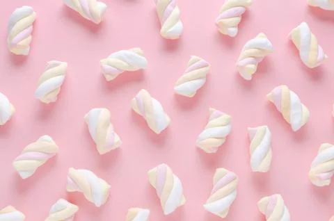 Marshmallow pattern on pink background, pastel colors Stock Photos