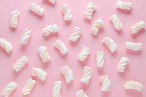 Marshmallow pattern on pink background, pastel colors, flat lay Stock Photos