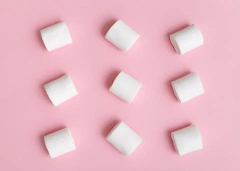 Marshmallow pattern, top view flat lay on colorful background Stock Photos