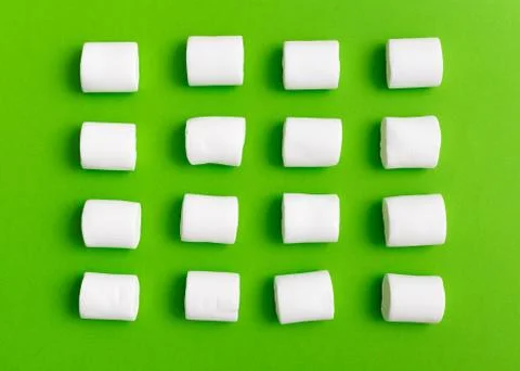 Marshmallow pattern, top view flat lay on colorful background Stock Photos