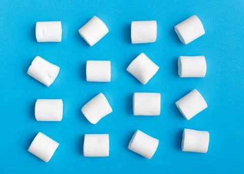 Marshmallow pattern, top view flat lay on colorful background Stock Photos