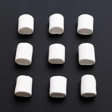 Marshmallow pattern, top view flat lay on colorful background Stock Photos