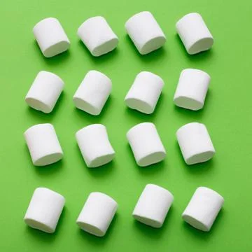 Marshmallow pattern, top view flat lay on colorful background Stock Photos