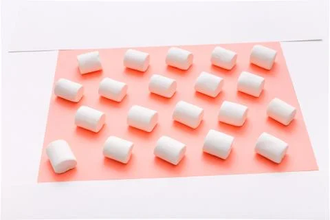 Marshmallow pattern, top view flat lay on colorful background Stock Photos