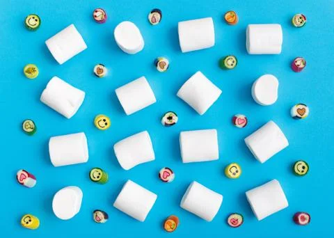 Marshmallow pattern, top view flat lay on colorful background Stock Photos