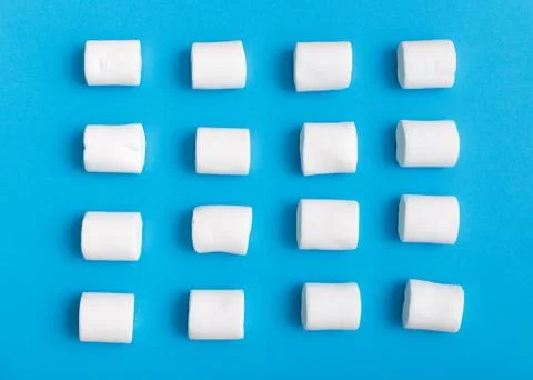 Marshmallow pattern, top view flat lay on colorful background Stock Photos