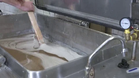 Marshmallow production process candy maker cooking mixture manually Stock Footage 69184133