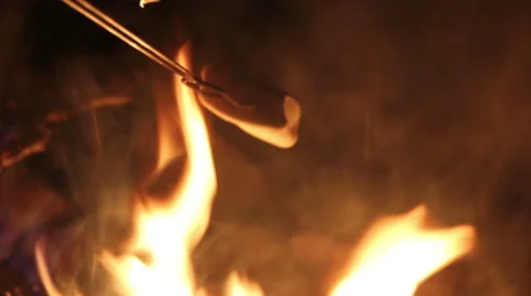 Marshmallow Roasting over Camp Fire Stock Footage 41452650