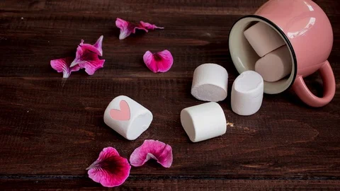 Marshmallow on wooden dark table Stock Footage 107907446