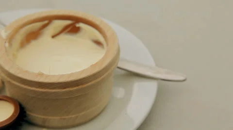 Marshmallows and milk on the table in the dish Stock Footage 60597732