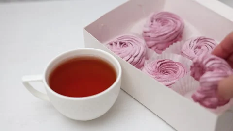 Marshmallows with blackberries taste in box or kitchen tiles 스톡 동영상 242591680