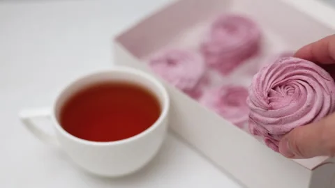 Marshmallows with blackberries taste in box or kitchen tiles 스톡 동영상 242591682