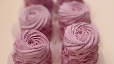 Marshmallows with blackberries taste in box or kitchen tiles 스톡 동영상 242591852