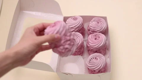 Marshmallows with blackberries taste in box or kitchen tiles 스톡 동영상 242591877