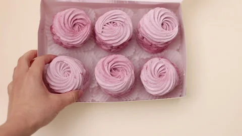 Marshmallows with blackberries taste in box or kitchen tiles 스톡 동영상 242591903