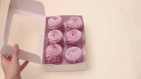 Marshmallows with blackberries taste in box or kitchen tiles 스톡 동영상 242591904