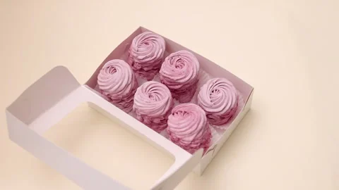 Marshmallows with blackberries taste in box or kitchen tiles 스톡 동영상 242591905