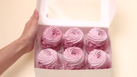 Marshmallows with blackberries taste in box or kitchen tiles 스톡 동영상 242591909