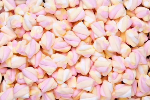 Marshmallows on blue background with copyspace. Flat lay or top view. Backgro Stock Photos