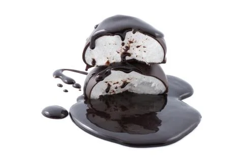 Marshmallows in chocolate syrup isolated Stock Photos