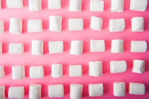  Marshmallows close-up and copy space on a pink background.  Stock Photos
