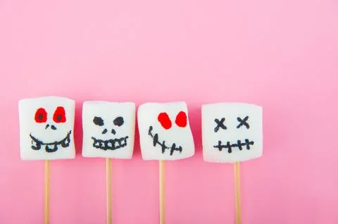  Marshmallows close-up and copy space on a pink background. Marshmallows for Hal Stock Photos