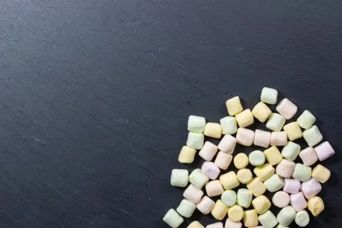 Marshmallows on colorful background Stock Photos