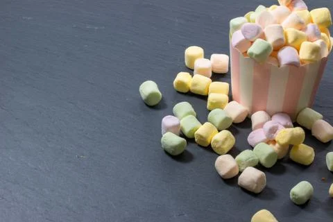 Marshmallows on colorful background Stock Photos