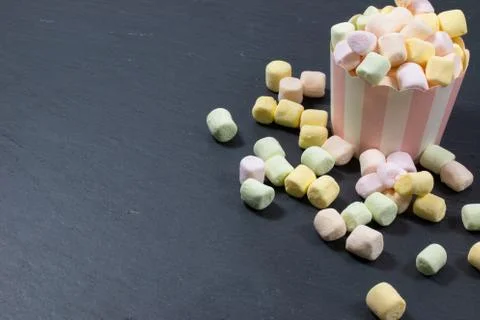 Marshmallows on colorful background Stock Photos