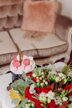Marshmallows fruit grapes table flowers decor holiday 스톡 사진