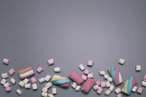 Marshmallows on the grey background, with free space for text. Stock Photos