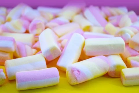 Marshmallows on the pink background, closeup Stock Photos