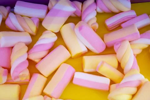 Marshmallows on the pink background, closeup Stock Photos