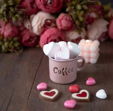 Marshmallows in the shape of hearts in a coffee mug Stock Photos