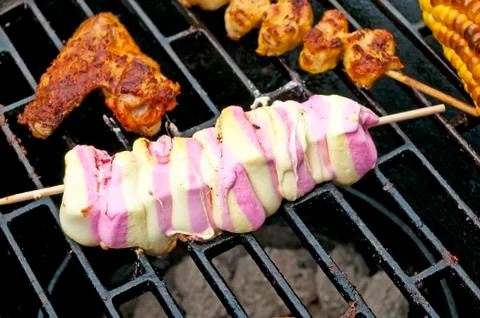 Marshmellow on barbecue Stock Photos