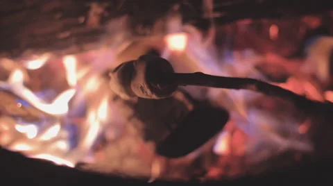Marshmellows Roasting Over Camp Fire Slowmo 스톡 동영상 65771314