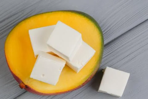 Marshmelow cubes on a gray background Stock Photos