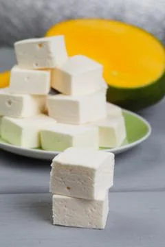 Marshmelow cubes on a plate Stock Photos